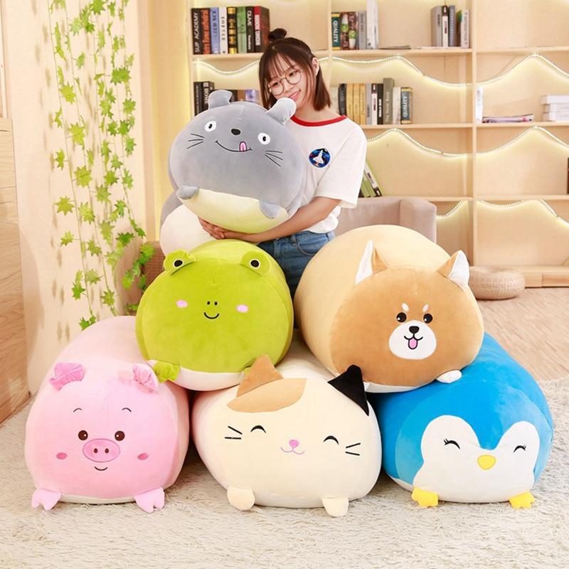 Person holding a stack of Soft plush long body pillow with cute animal designs, filled with down cotton, in 30cm–90cm sizes
