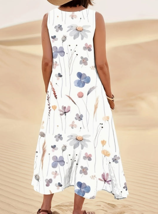 Woman wearing a white dress with floral patterns in a desert setting