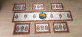 Set of block print decorative placemats on a table with a bowl of fruit.