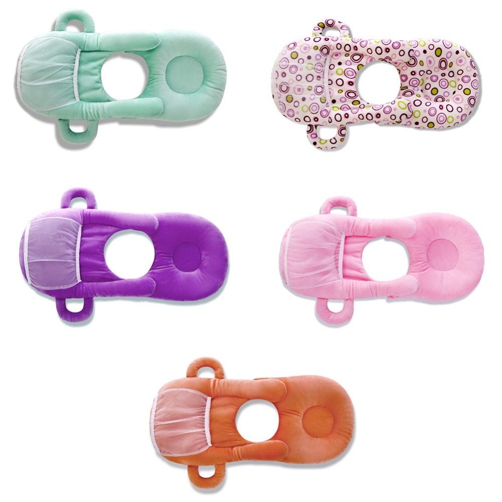 Soft plush baby feeding pillow with ergonomic anti-spit design, available in pink, purple, green
