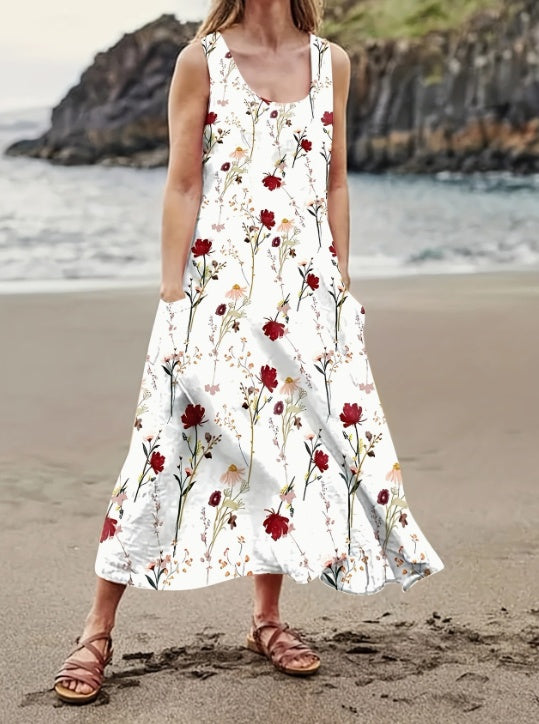 Woman wearing a floral dress on a beach