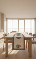 Decorative table runner with floral patterns on a wooden surface